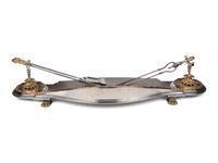 A Steel and Brass Fireplace Fender and Three Tools
