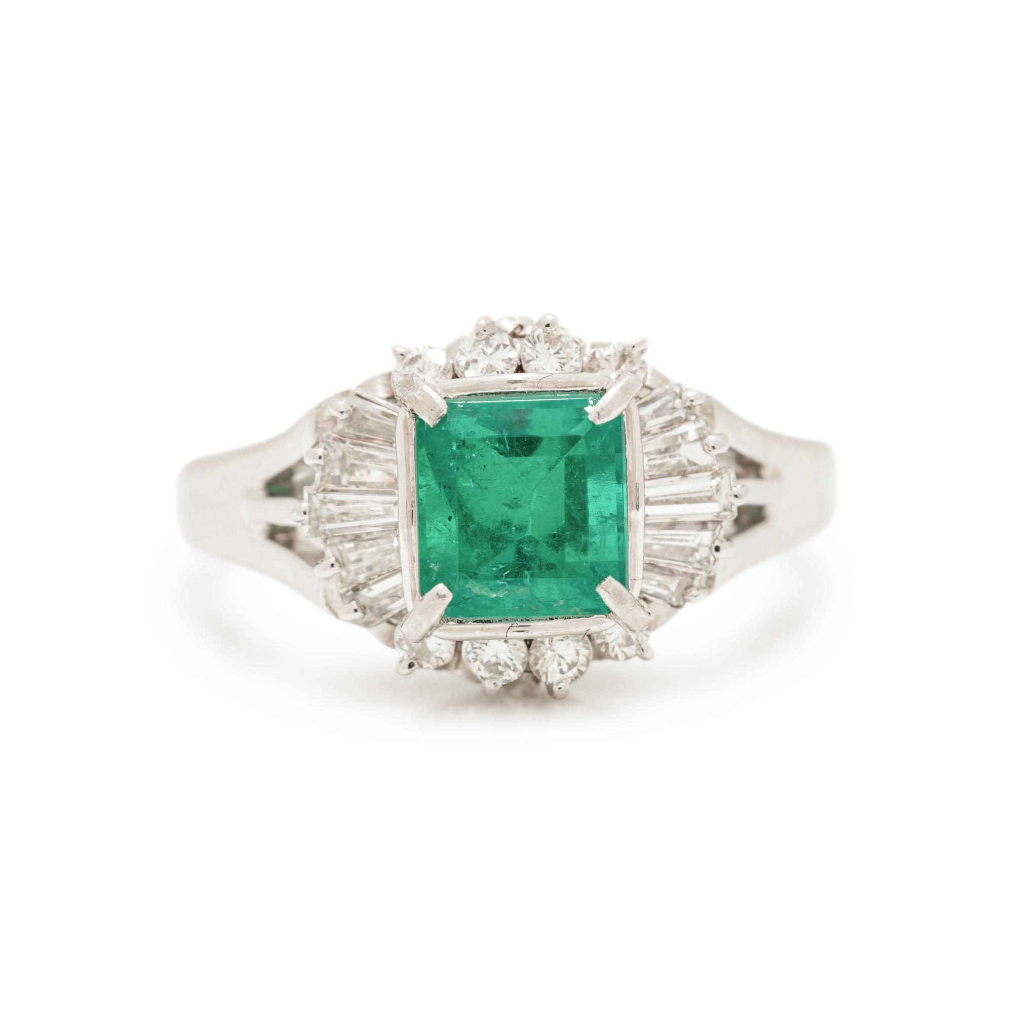 PLATINUM, EMERALD, AND DIAMOND RING