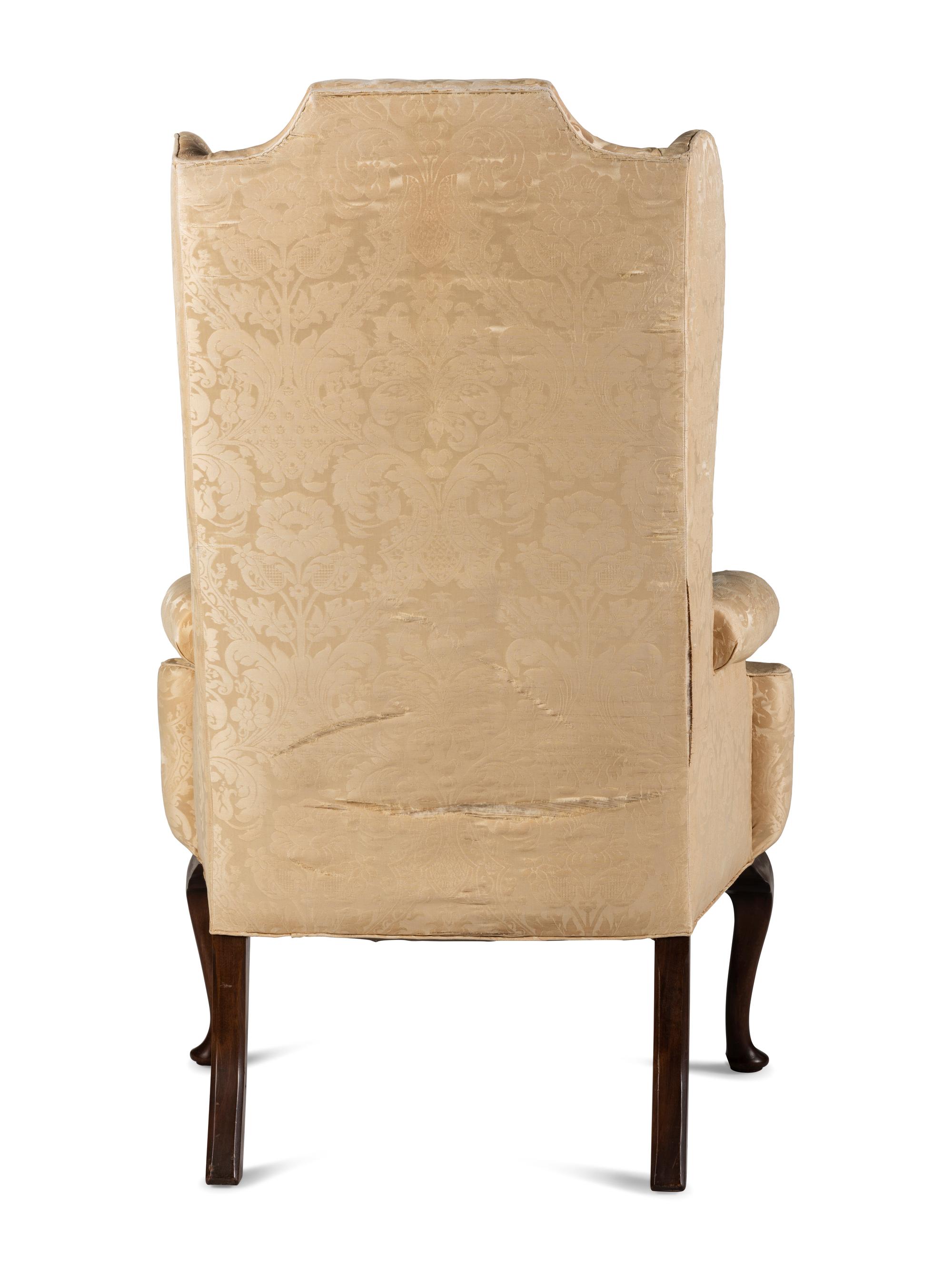 A Queen Anne Style Upholstered Pad Foot Easy Chair