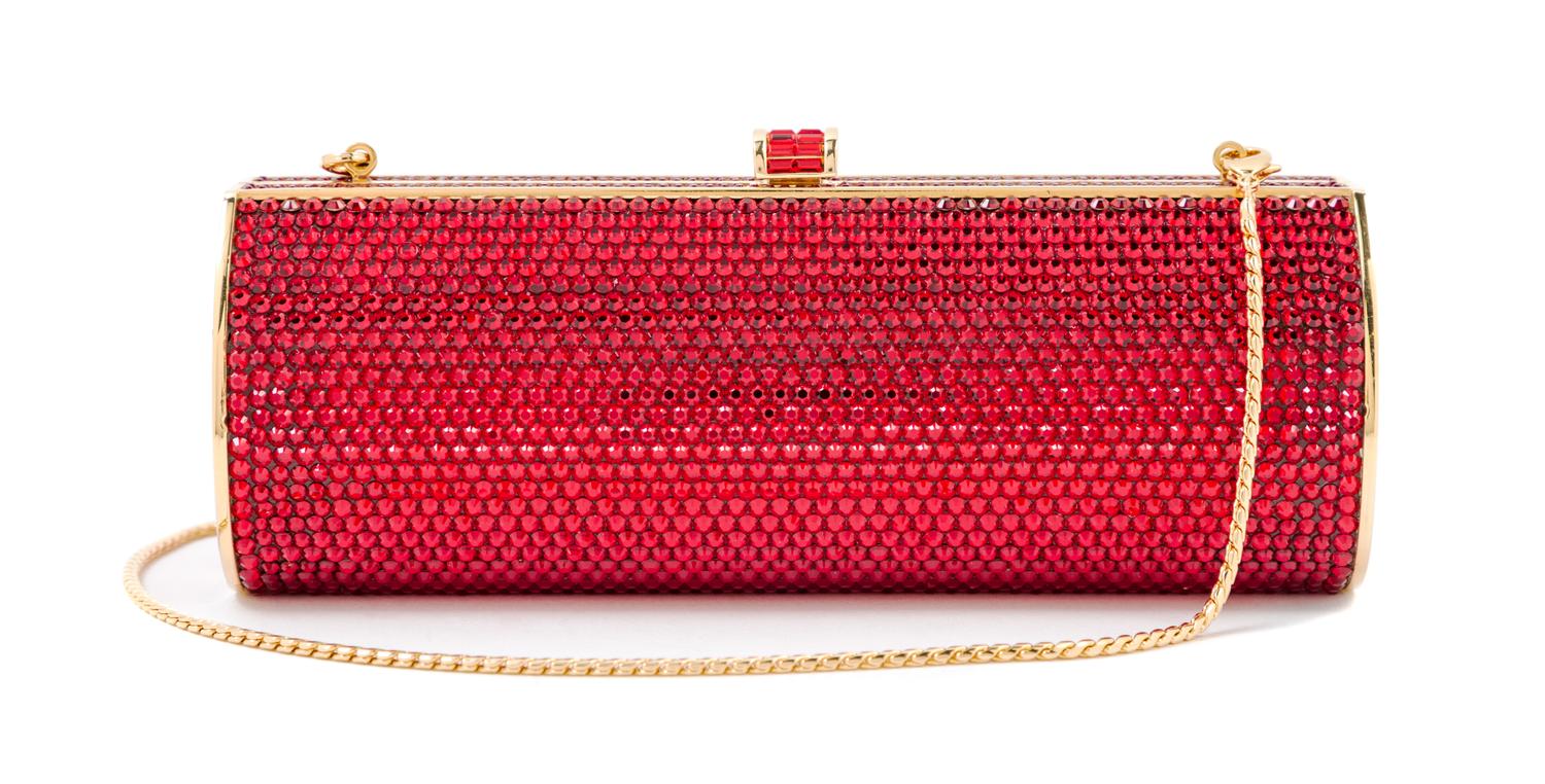 A Judith Leiber Ruby Red Crystal Oblong Clutch, 6.5" x 3" x 2".