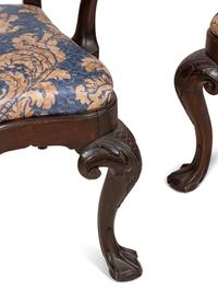 A Set of Twelve Continental Walnut Dining Chairs