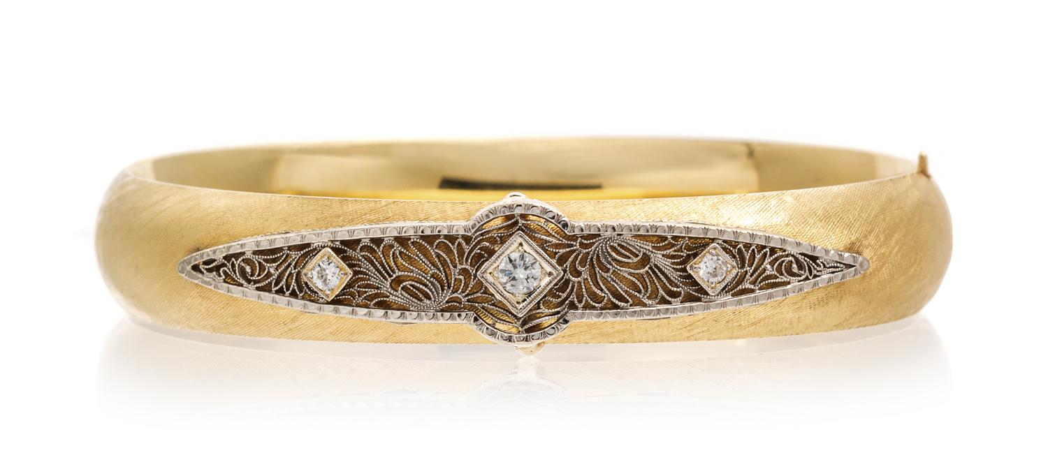 A 14 Karat Yellow Gold, Platinum and Diamond Bracelet, 10.60 dwts.