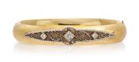 A 14 Karat Yellow Gold, Platinum and Diamond Bracelet, 10.60 dwts.