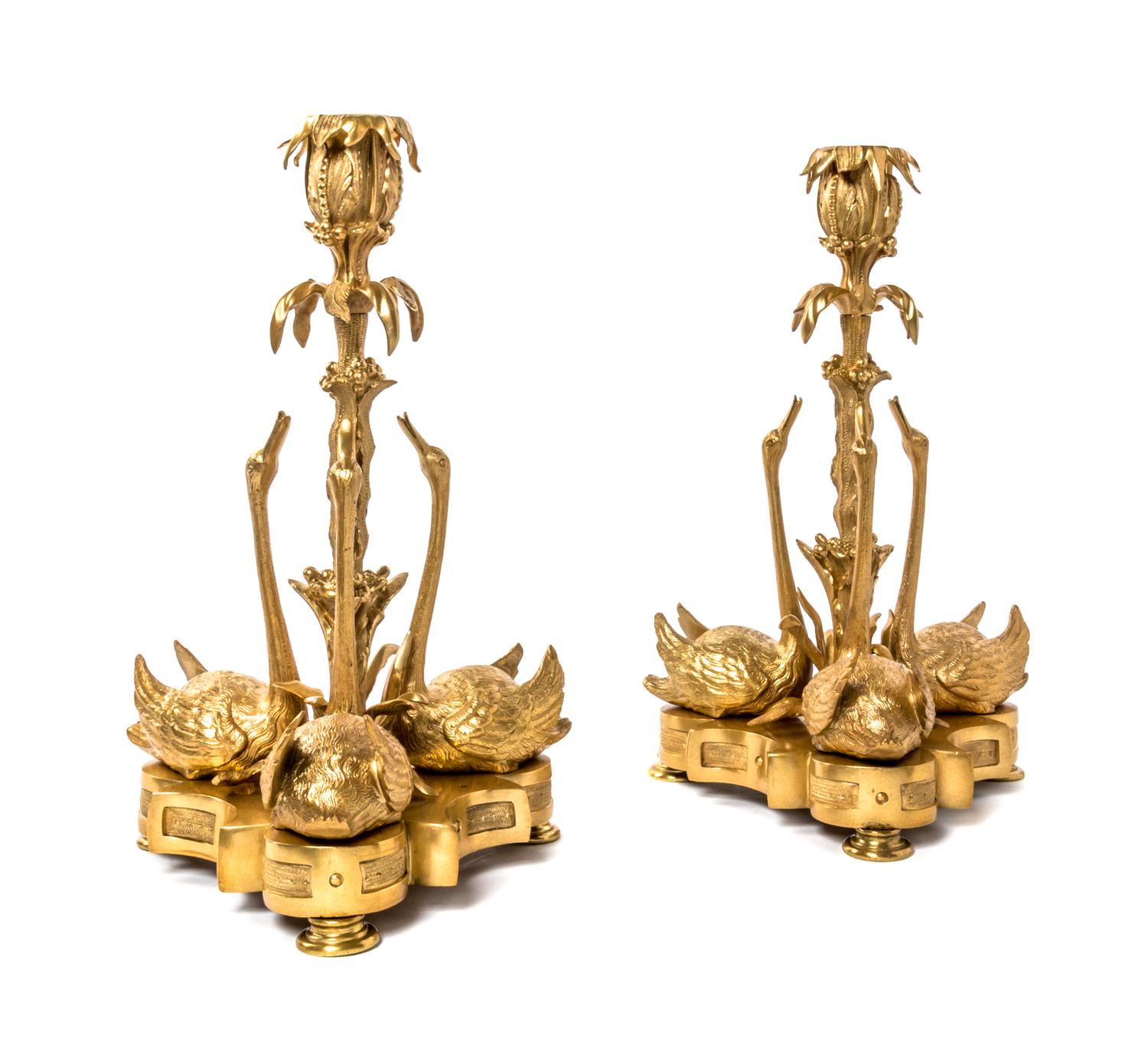 A Pair of Empire Style Gilt Bronze Candlesticks, Height 11 5/8 inches.