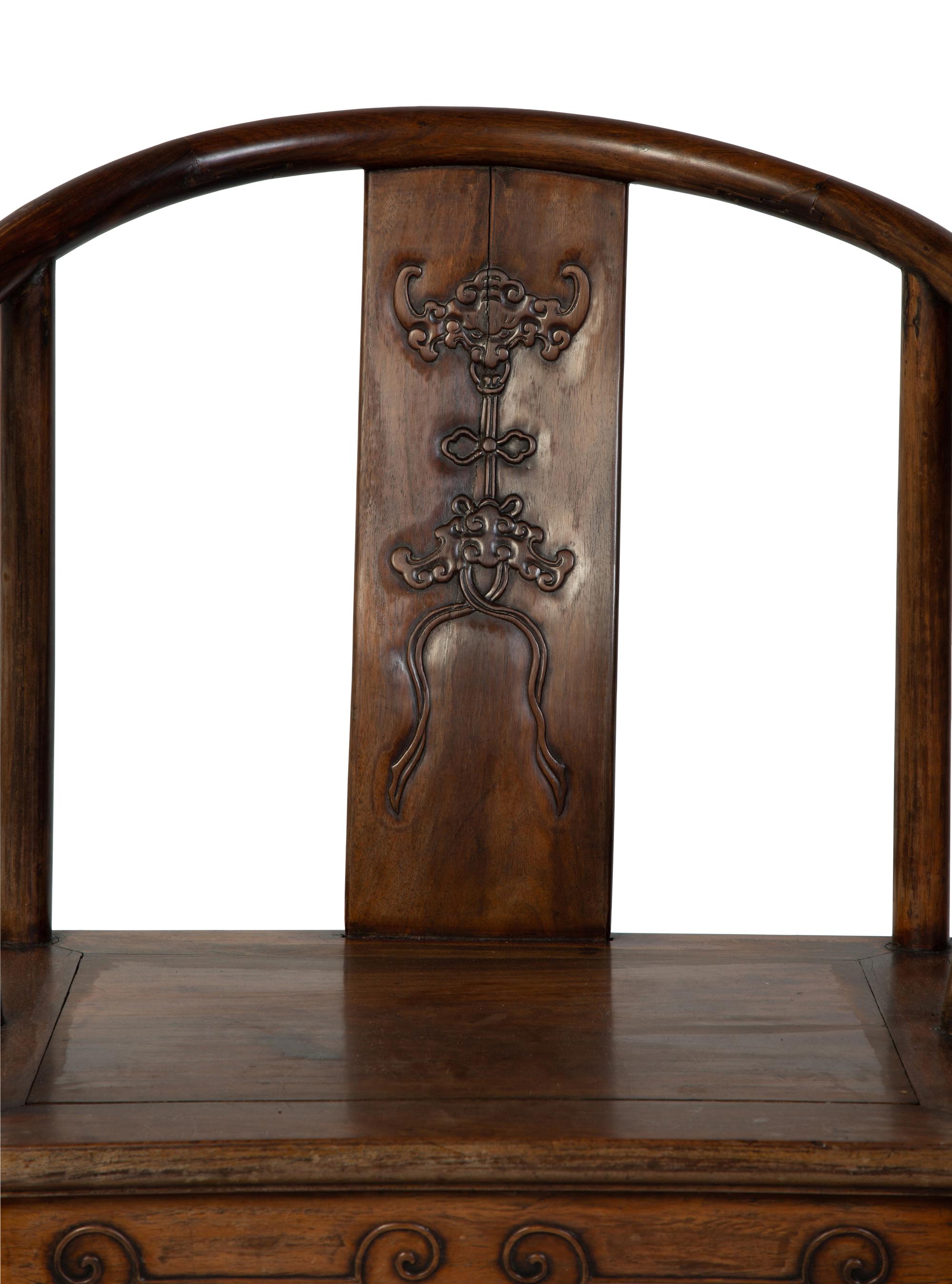 A Chinese Elmwood Horseshoe Back Armchair — LATE 19TH CENTURY