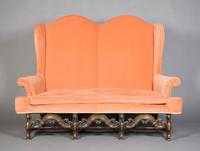 A Renaissance Revival Settee, Height 56 inches.