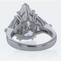 Three-Stone Diamond and Platinum Ring 5.97 Carat Pear-Shape Diamond, GIA Certified