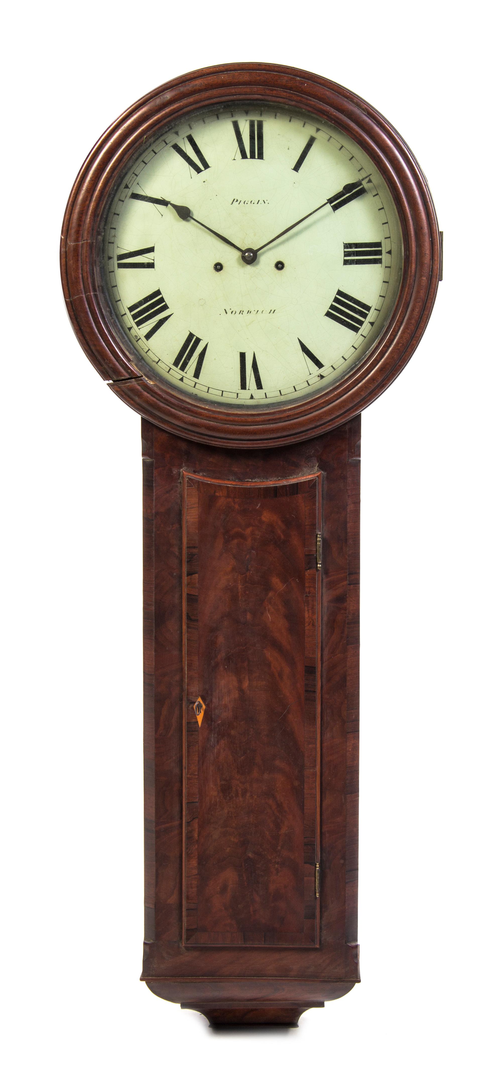 An English Mahogany Regulator Clock, John Piggin of Norwich, Height 50 5/8 inches.
