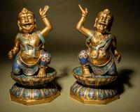 A Pair of Gilt Bronze and Cloisonné Enamel 'Foreigner' Stands
