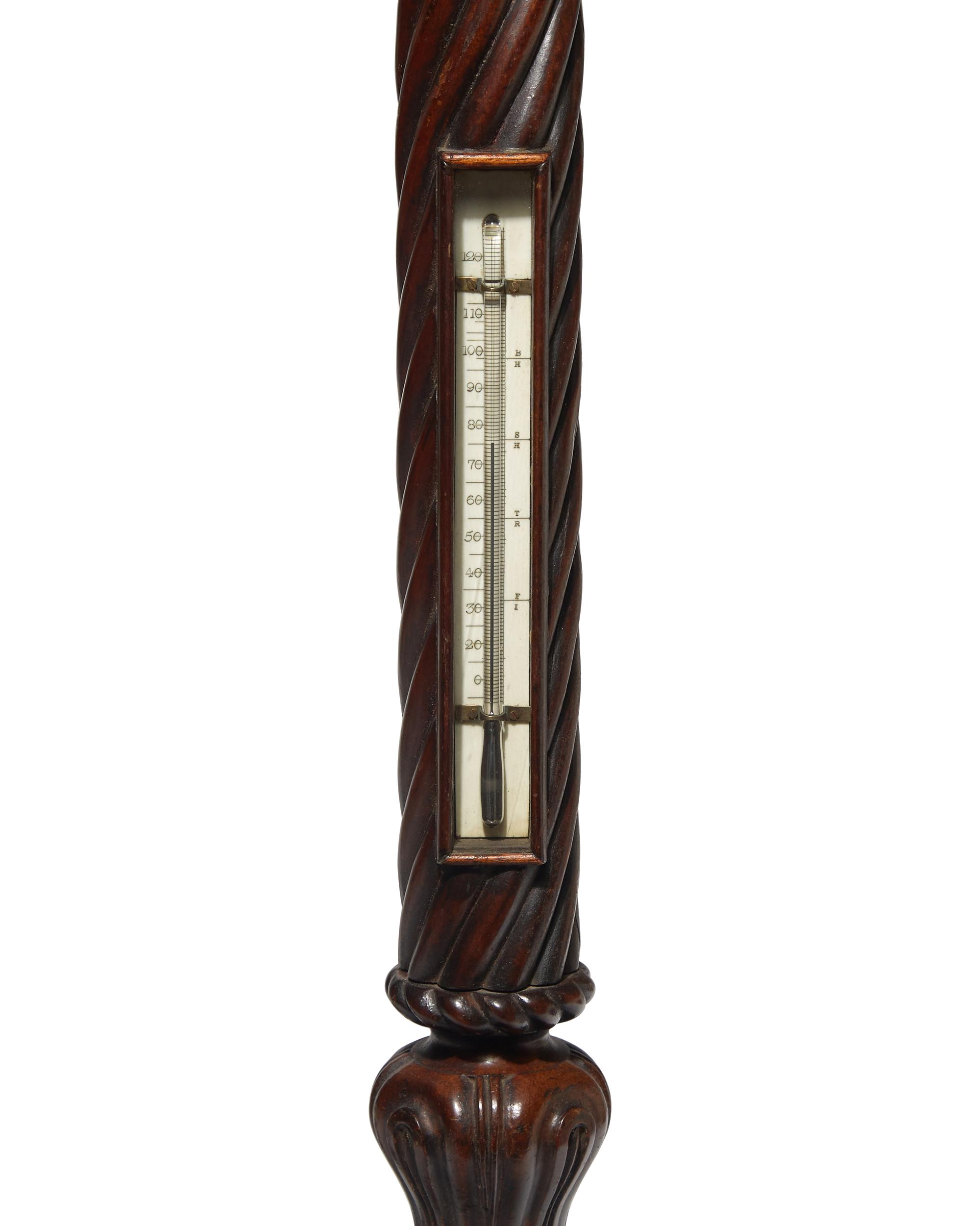 A Fine English Brass Mounted Spiral-Twist Carved Mahogany Gimballed Barometer