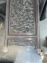 A Chinese carved hardwood six-panel “Dragons” screen 硬木浮雕龙纹六开屏风