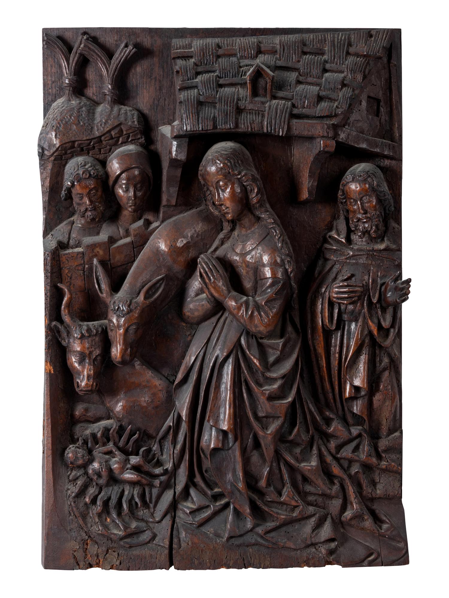 A Franco-Flemish Carved Chestnut Relief Panel Depicting the Adoration of the Christ Child