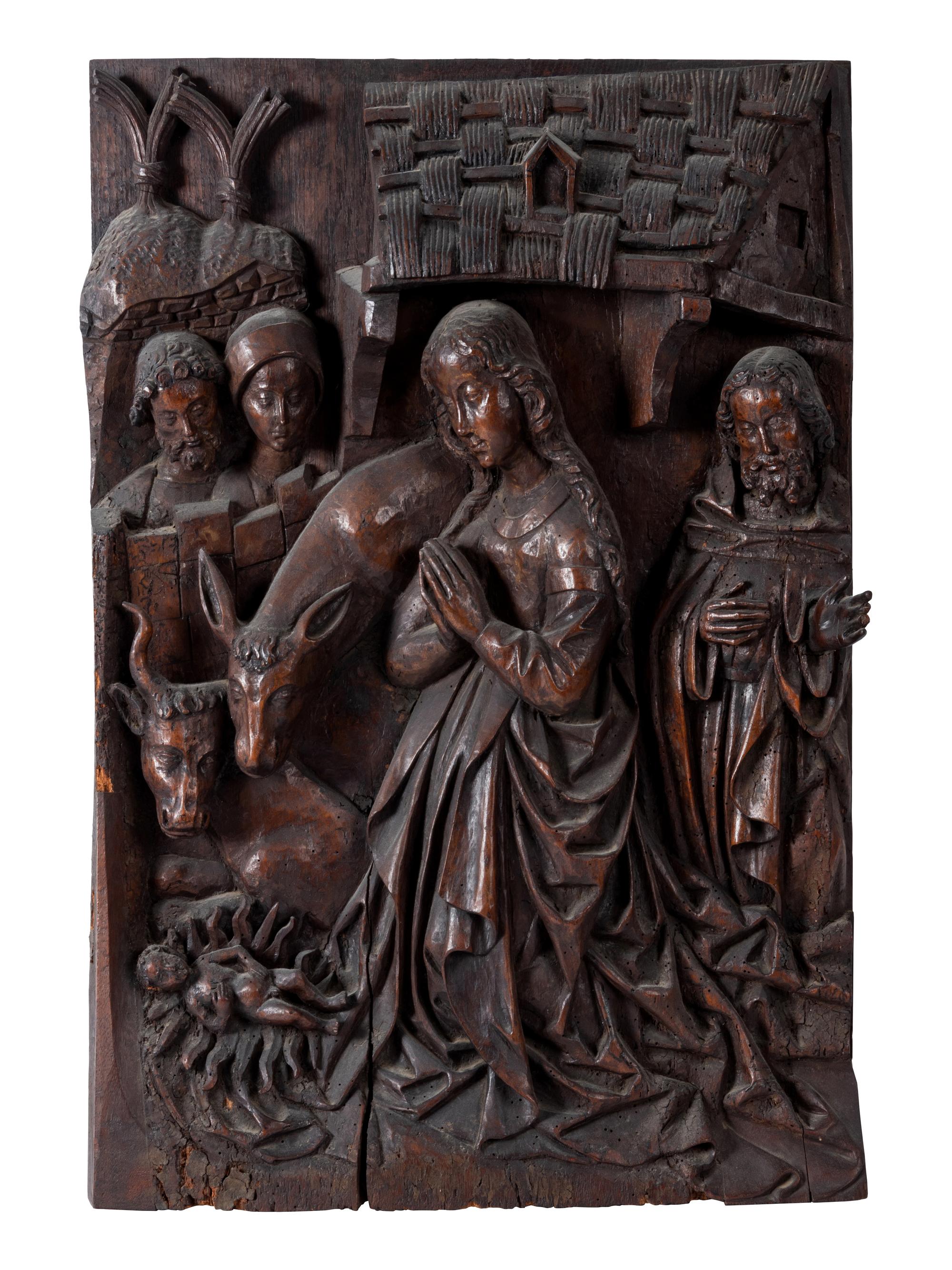 A Franco-Flemish Carved Chestnut Relief Panel Depicting the Adoration of the Christ Child