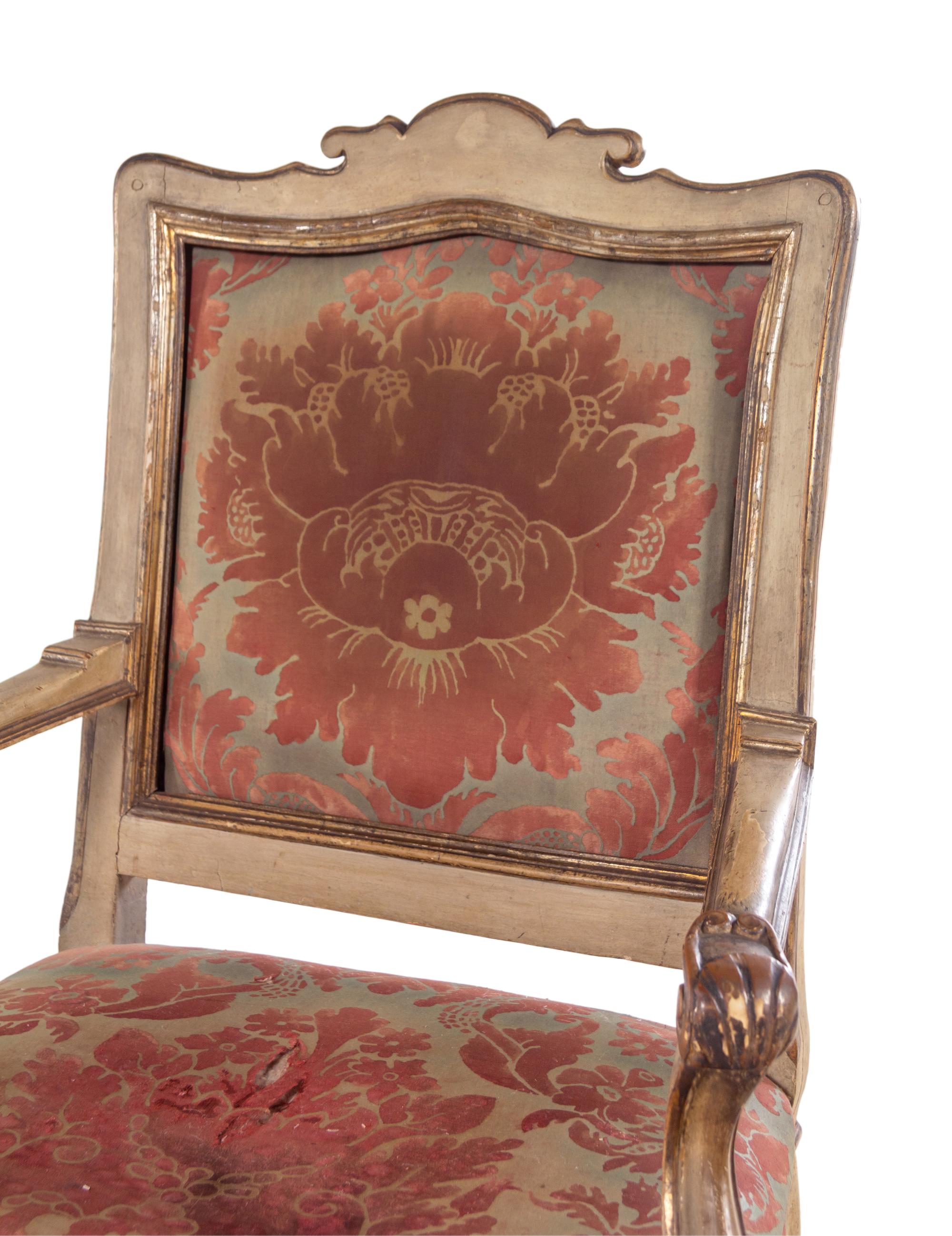 A Set of Four Italian Cream-Painted and Parcel Gilt Armchairs