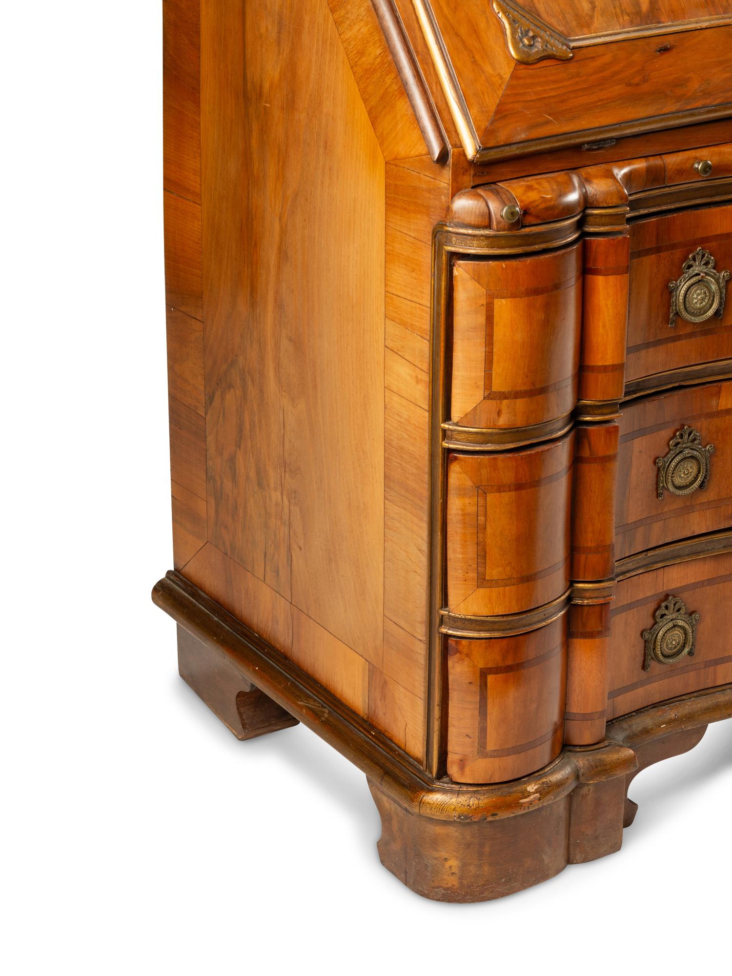 A Continental Parcel Gilt Walnut Slant-Front Bureau