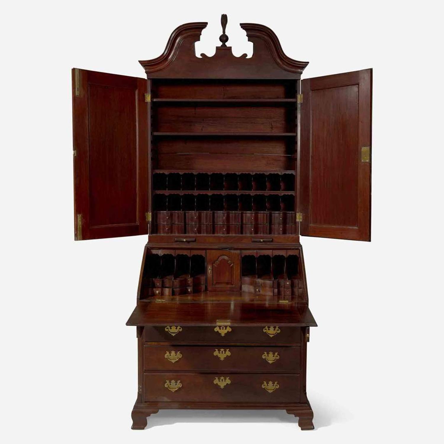 A Chippendale carved mahogany secretary desk and bookcase Possibly Pennsylvania, 18th century with later additions