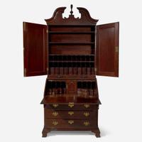 A Chippendale carved mahogany secretary desk and bookcase Possibly Pennsylvania, 18th century with later additions