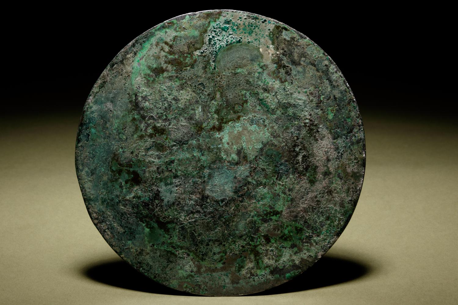 A Bronze Circular 'Phoenix’ Mirror