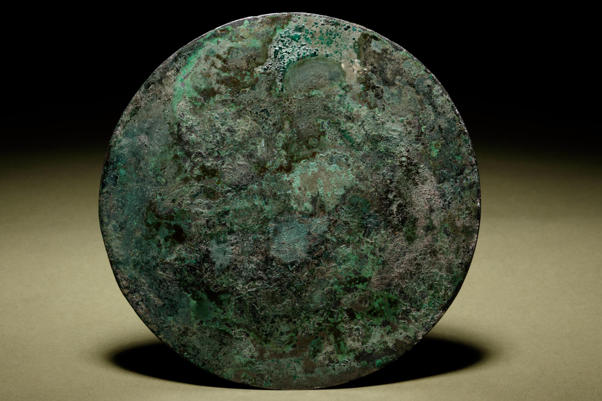 A Bronze Circular 'Phoenix’ Mirror