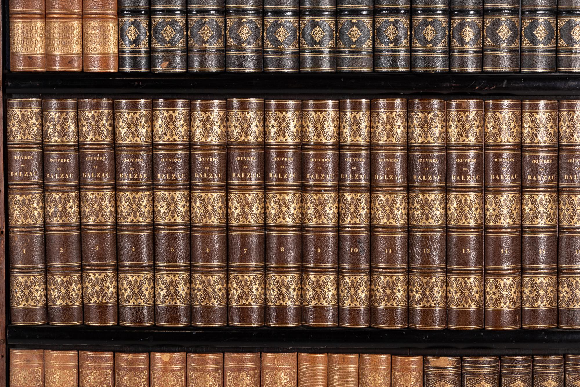A Pair of Faux Book Wall Panels