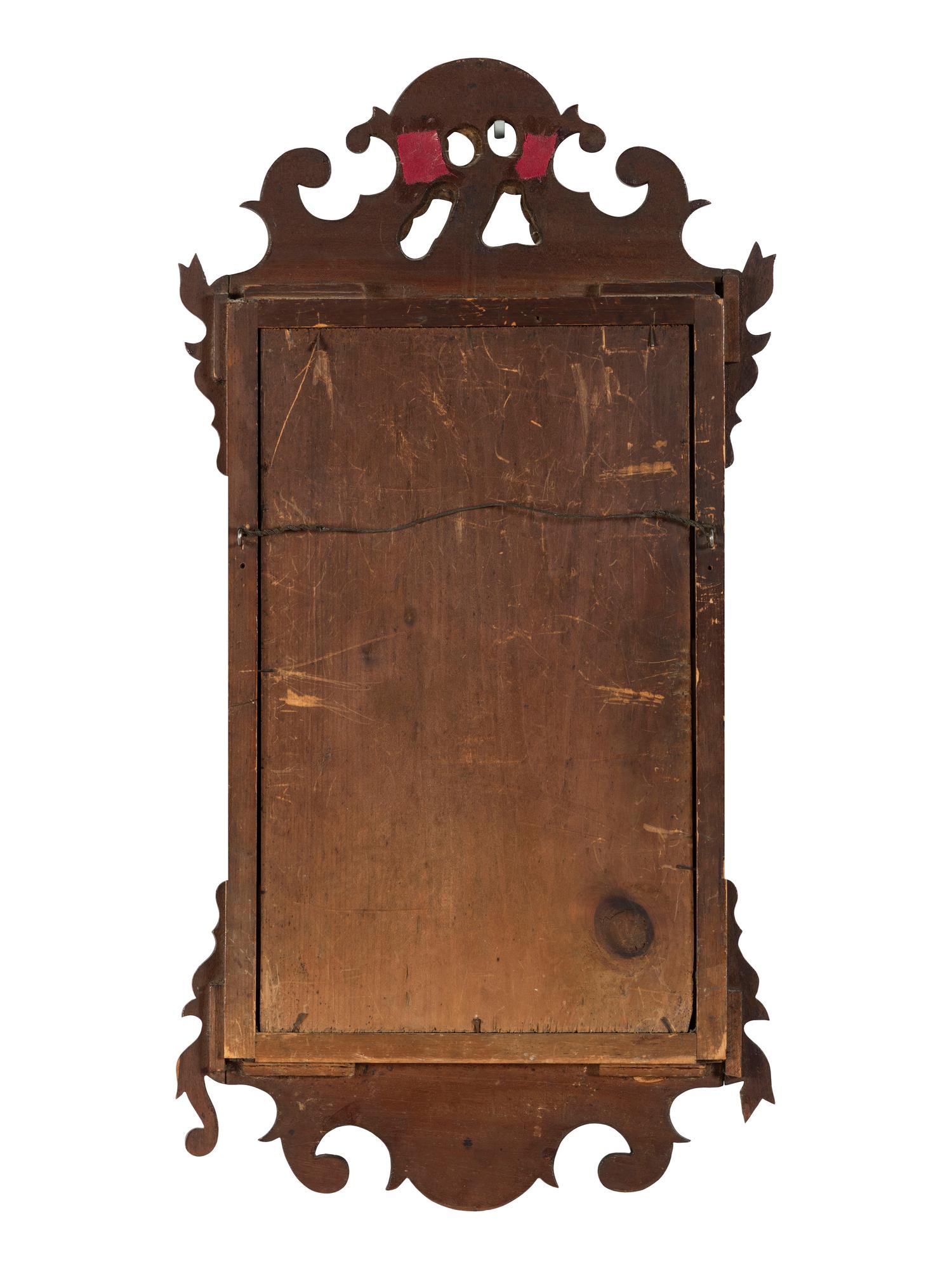 A George III Parcel Gilt Mahogany Mirror