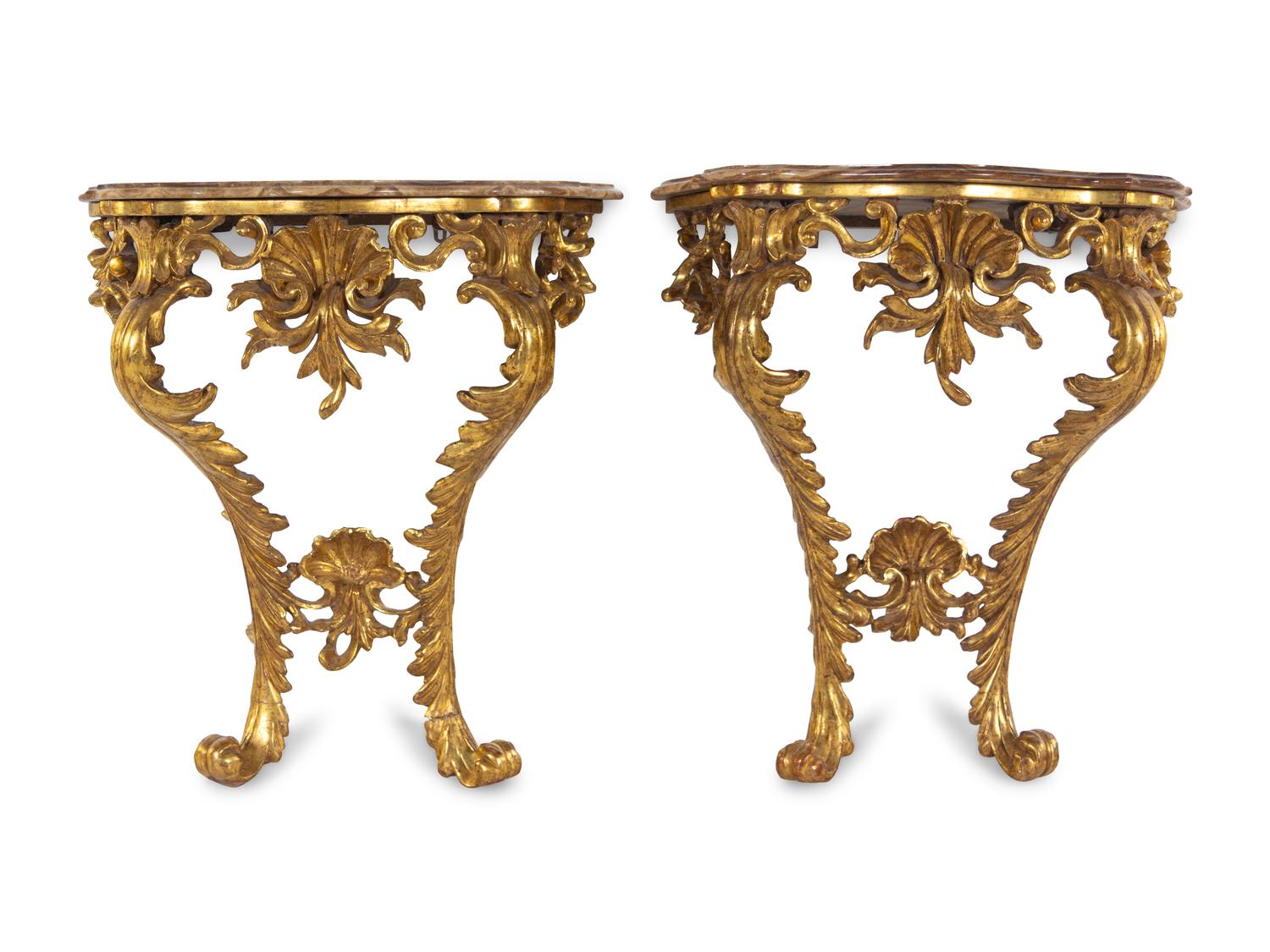 A Pair of Italian Baroque Giltwood Onyx-Top Console Tables