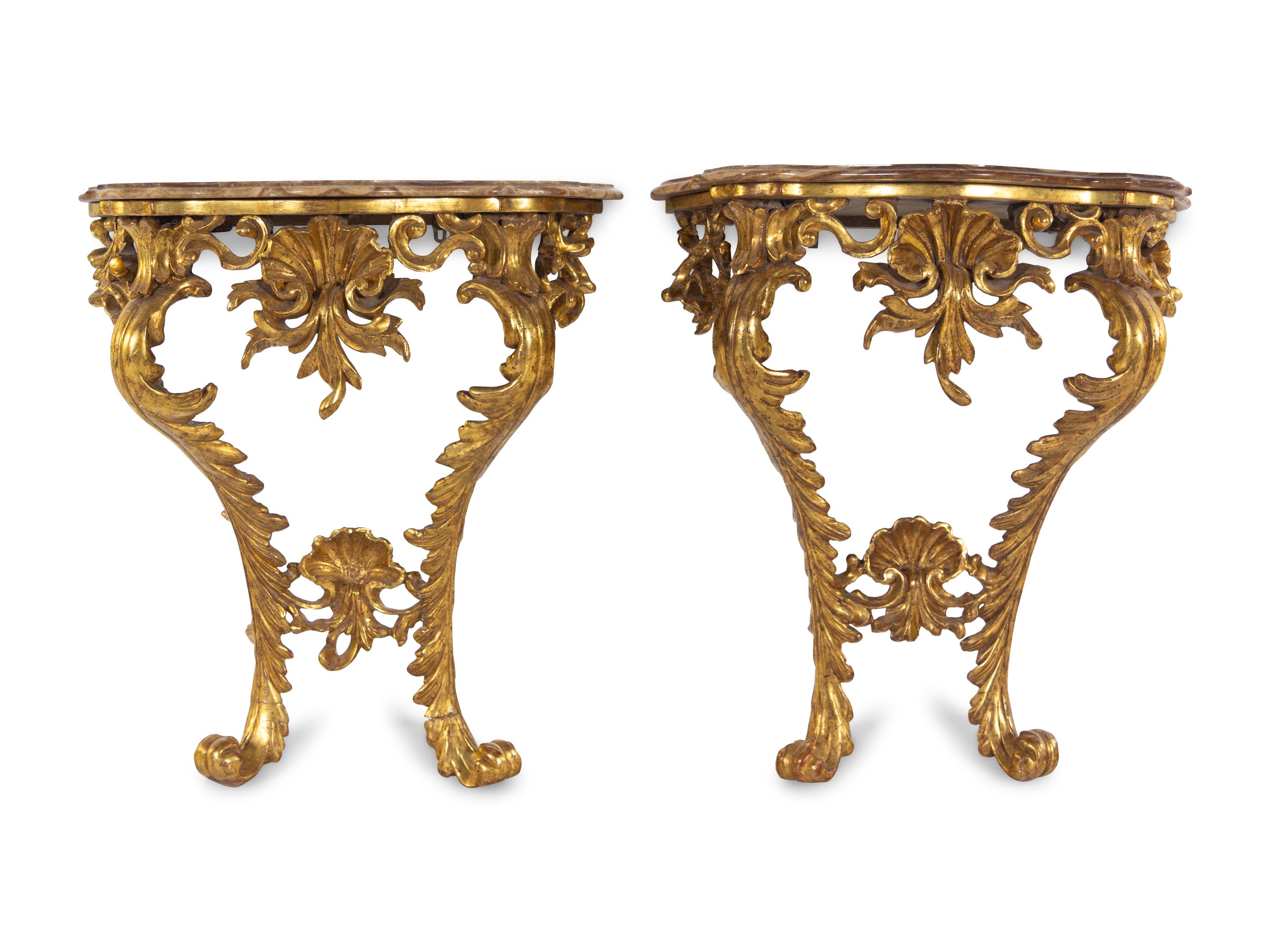 A Pair of Italian Baroque Giltwood Onyx-Top Console Tables