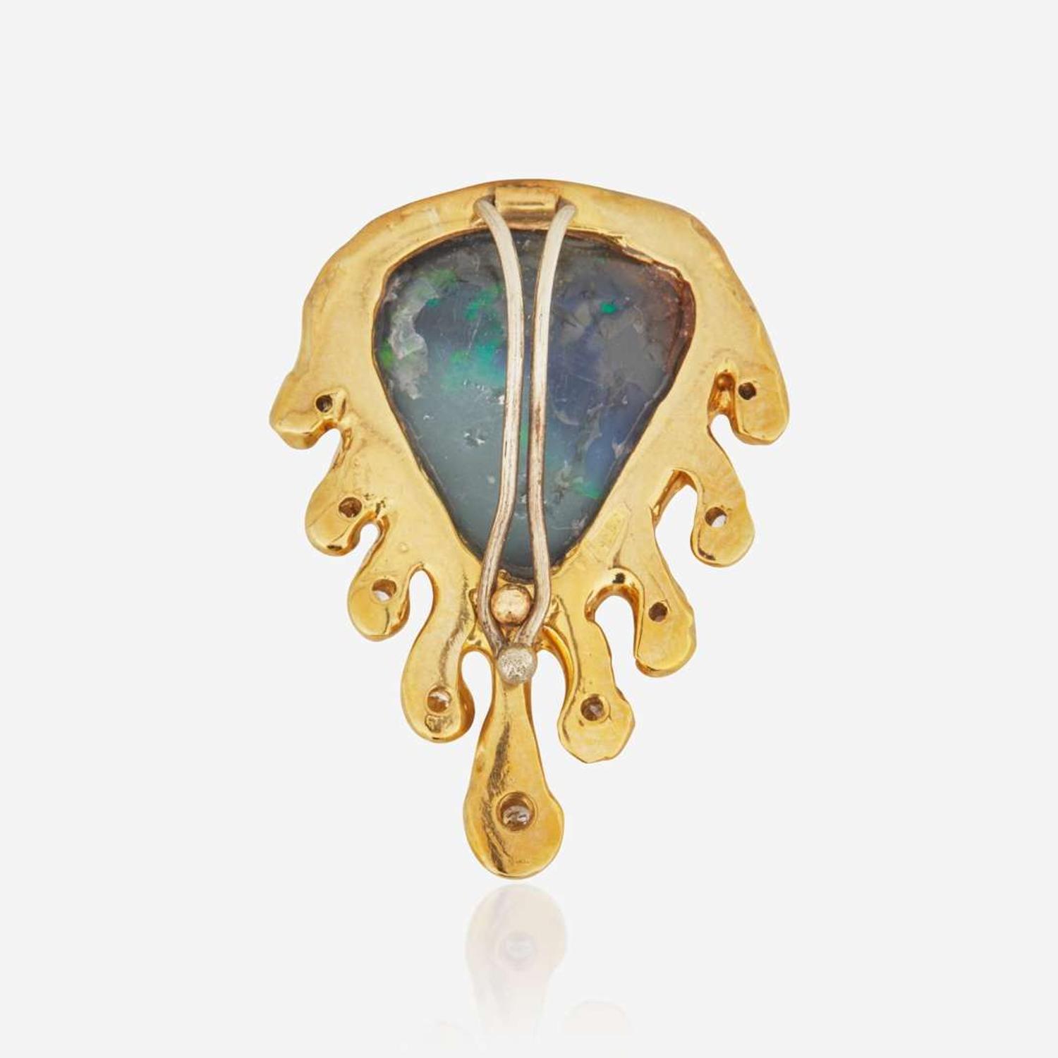 A Yellow Gold and Black Opal Pendant