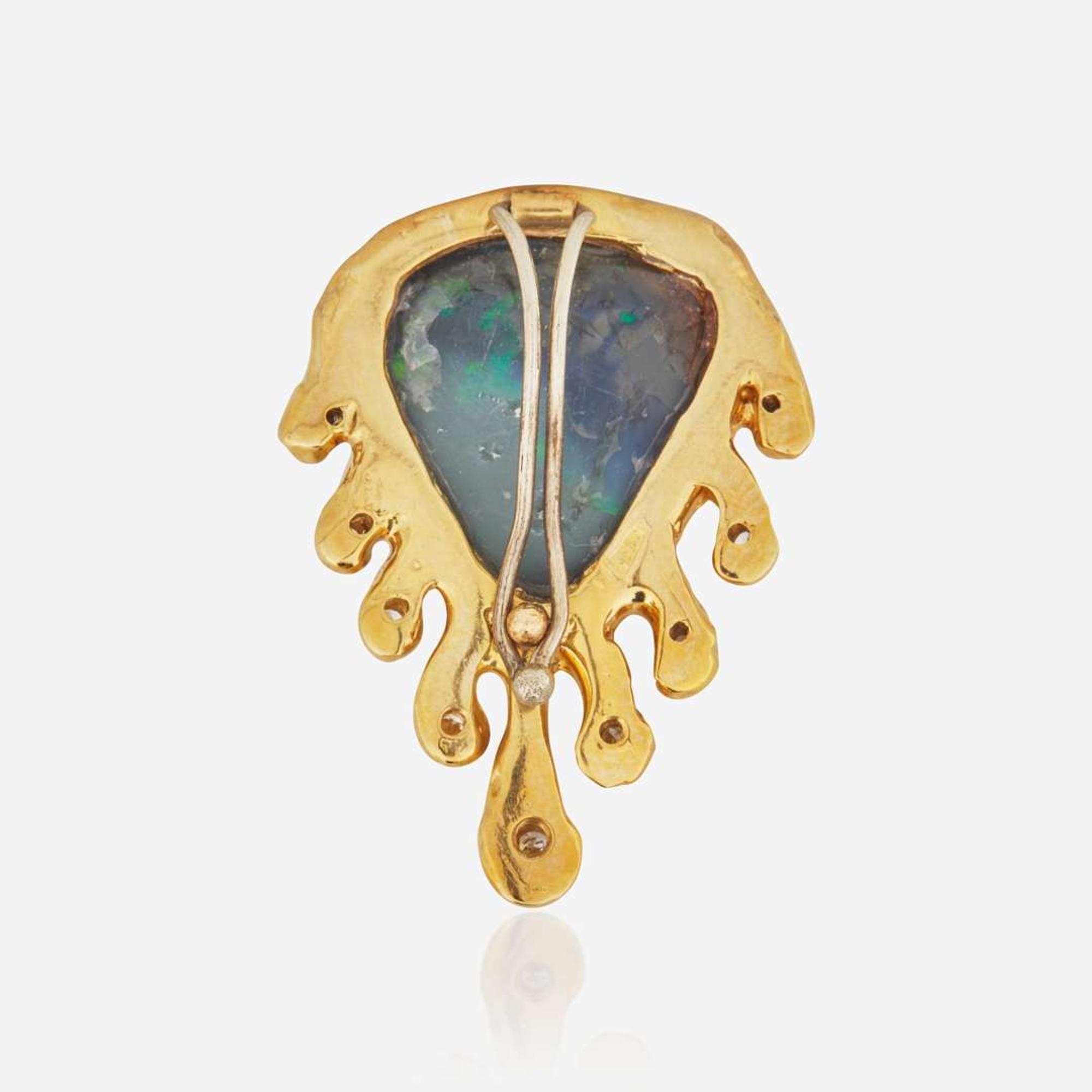 A Yellow Gold and Black Opal Pendant