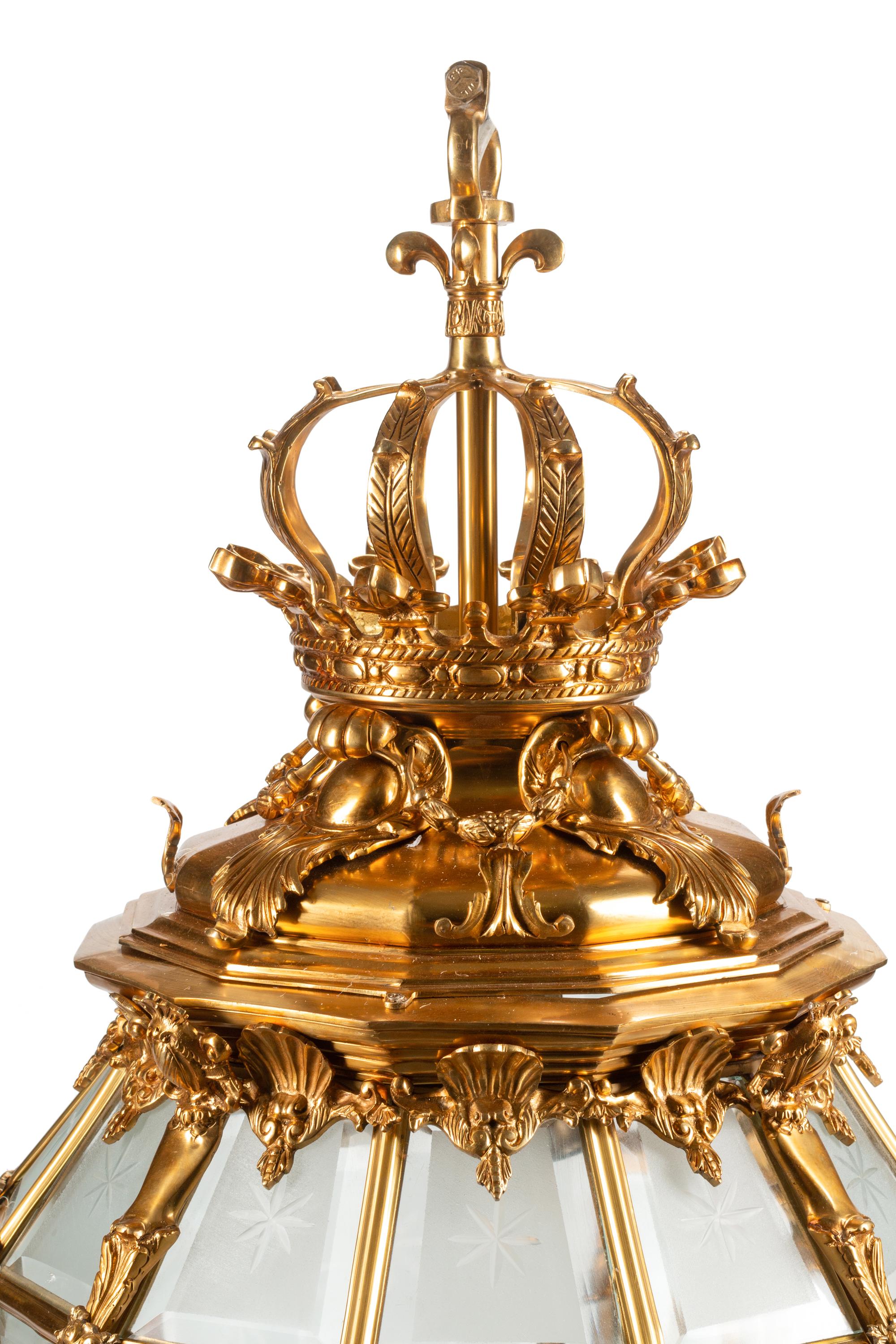 A Pair of Continental Gilt Bronze and Beveled Glass Hall Lanterns