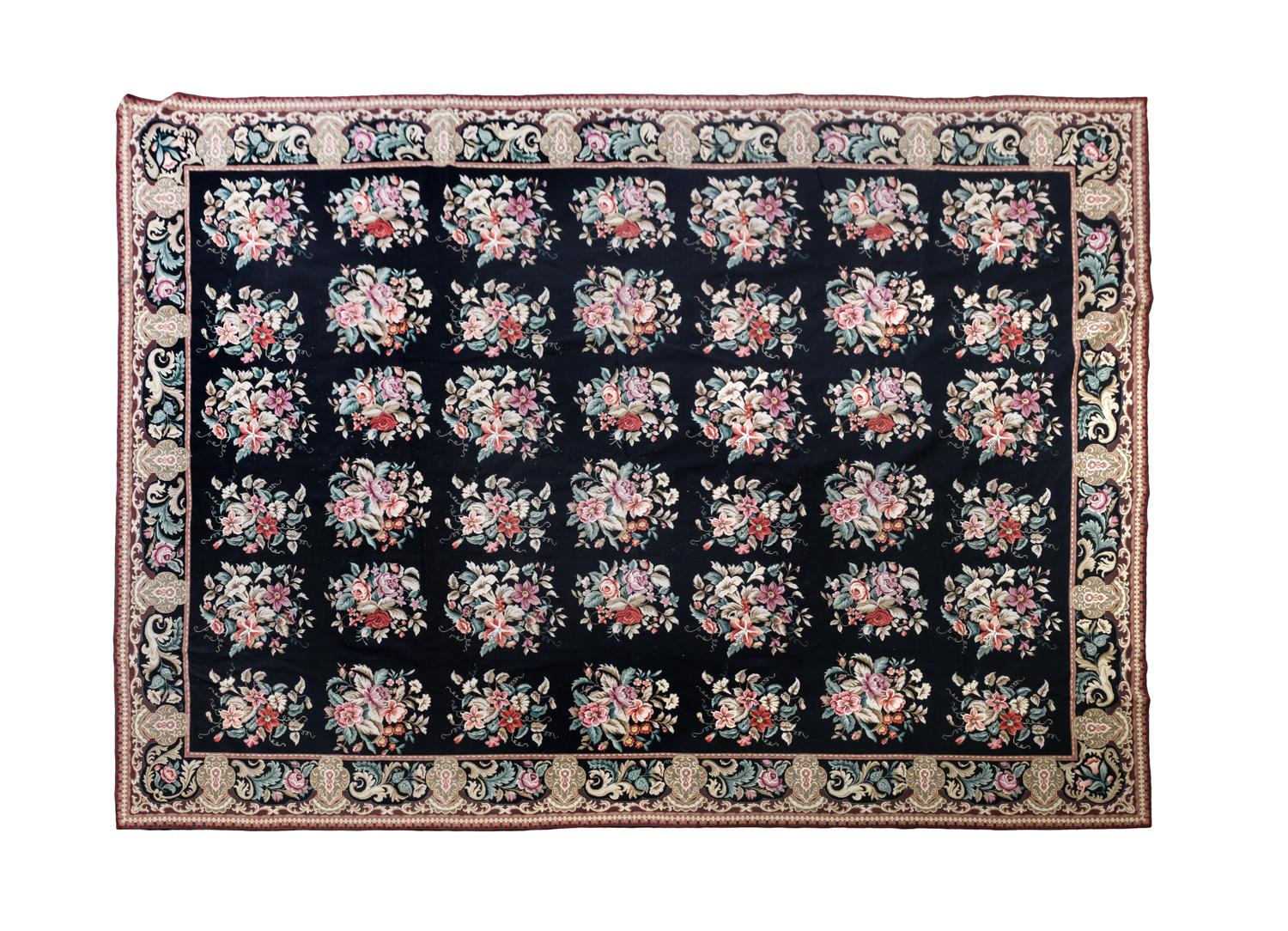 A Needlepoint Rug 10 feet x 14 feet.
