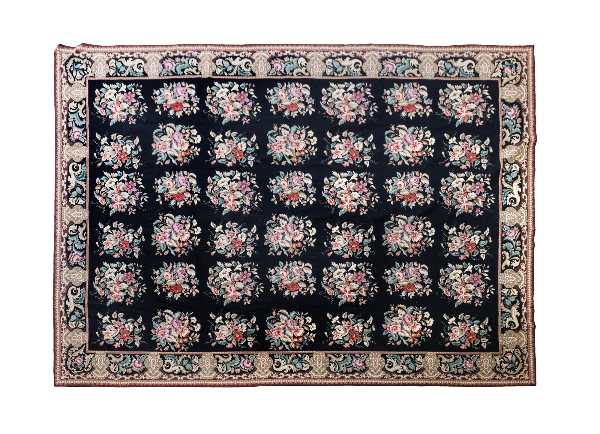 A Needlepoint Rug 10 feet x 14 feet.