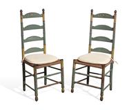 A Pair of Green-Painted and Decorated Ladder-Back Rush-Seat Side Chairs