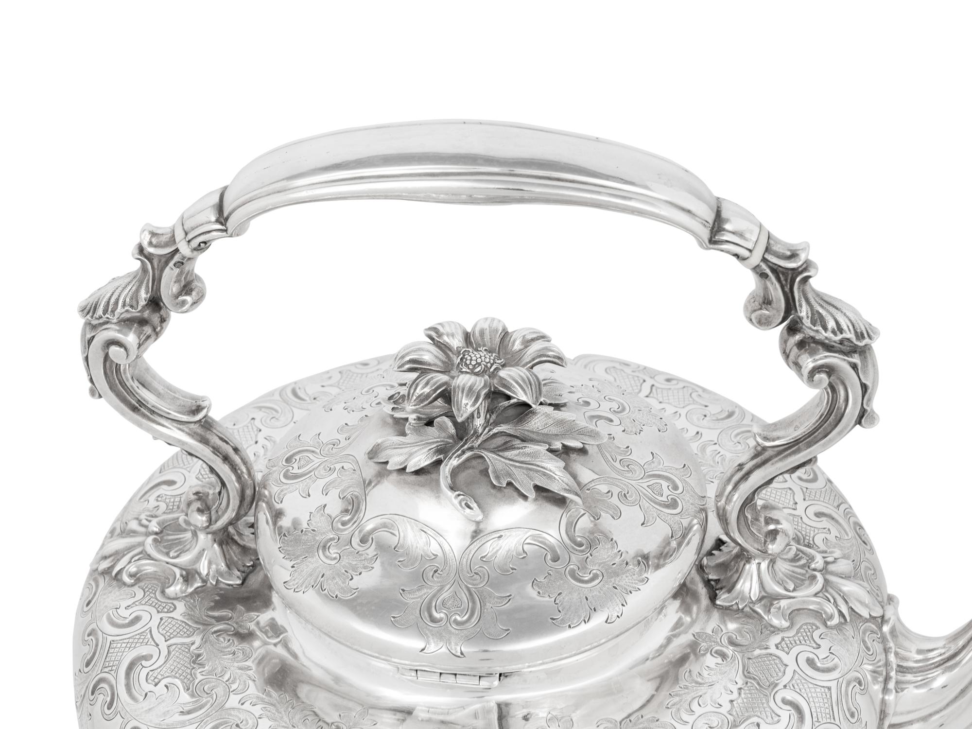 A Victorian Silver Hot Water Kettle on Stand