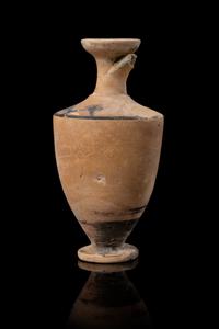An Attic Black-Figured Lekythos Height 5 inches. — CIRCA 5TH CENTURY B.C.E.