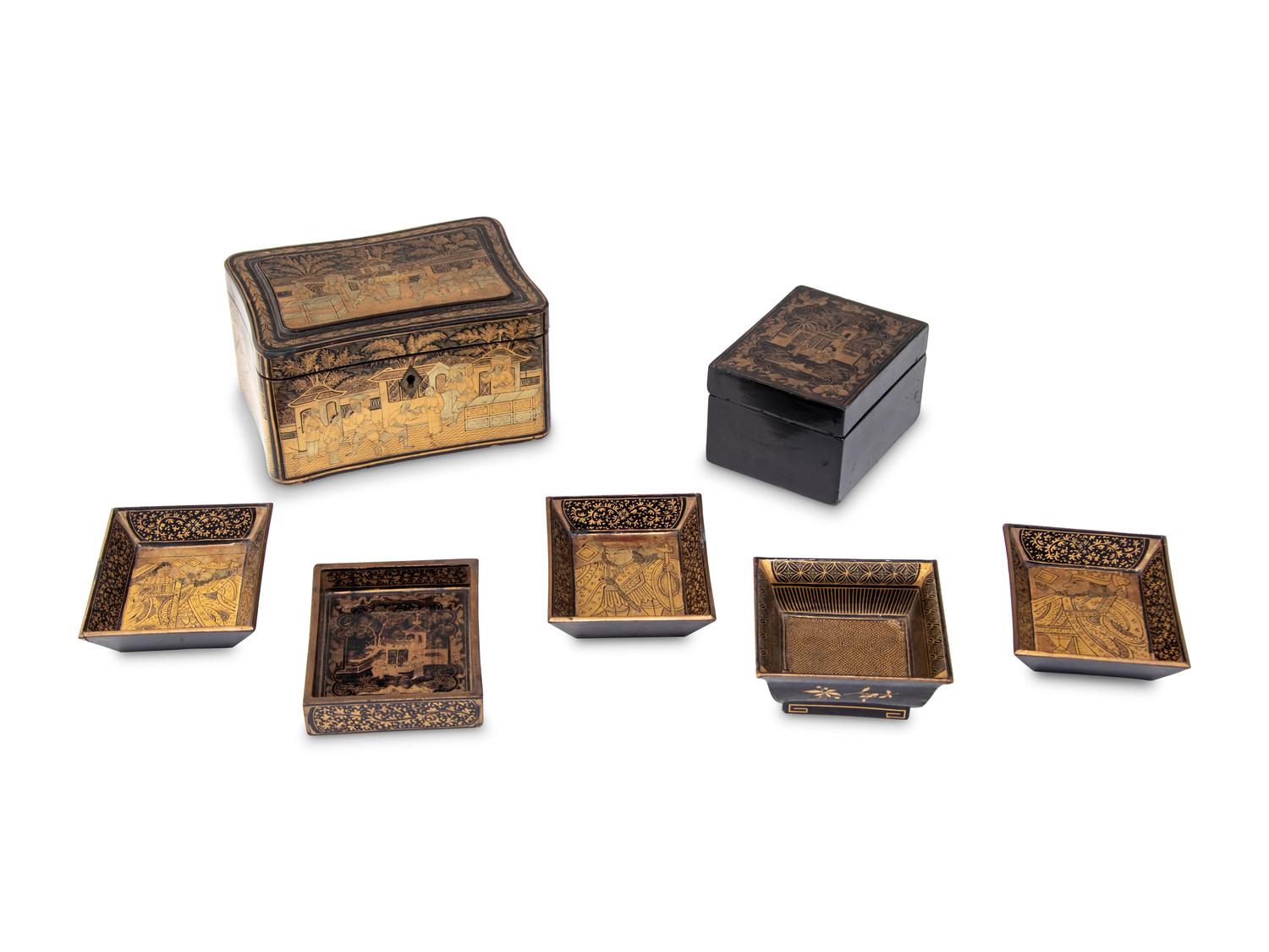 Seven Chinese Export Gilt and Black Lacquered Boxes and Dishes