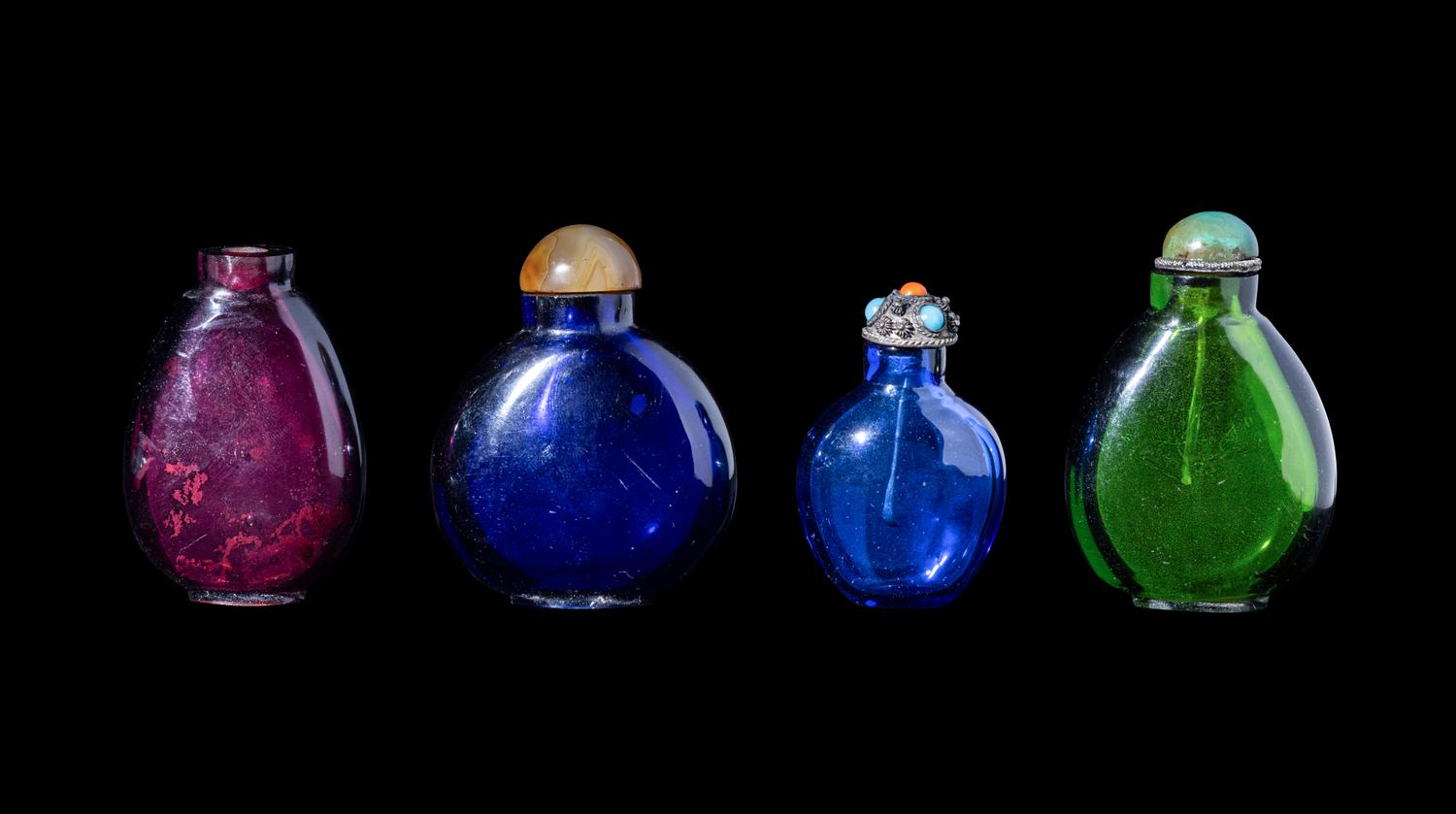 Four Chinese Transparent Glass Snuff Bottles