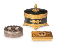 An English Silver Box, an Italian Gilt Metal Box and a Patinated Metal Table Casket