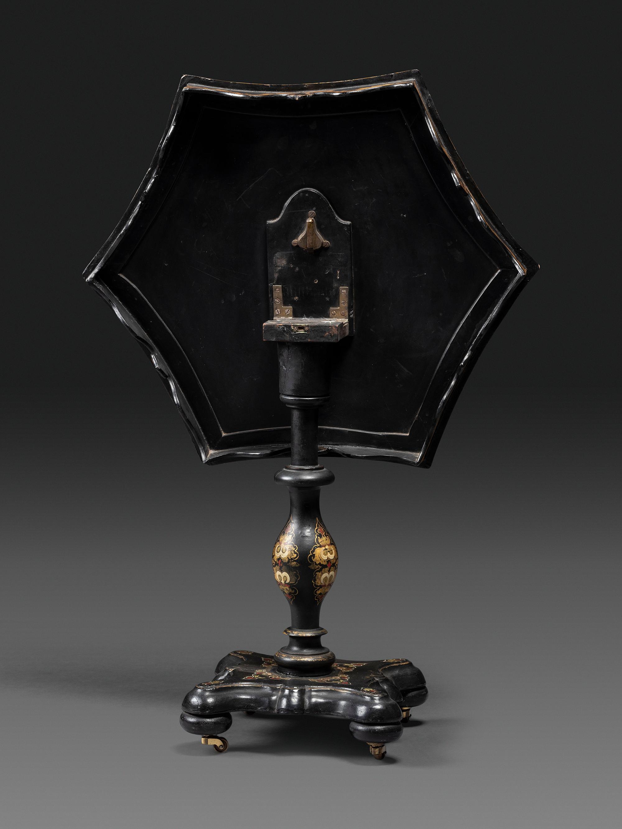 A Victorian Parcel-Gilt and Black Lacquered Mother-of-Pearl Inlaid Hexagonal Tilt-Top Tea Table