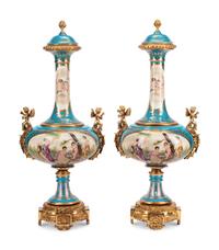 A Pair of Gilt Bronze Mounted Sèvres Style Porcelain Vases and Covers
