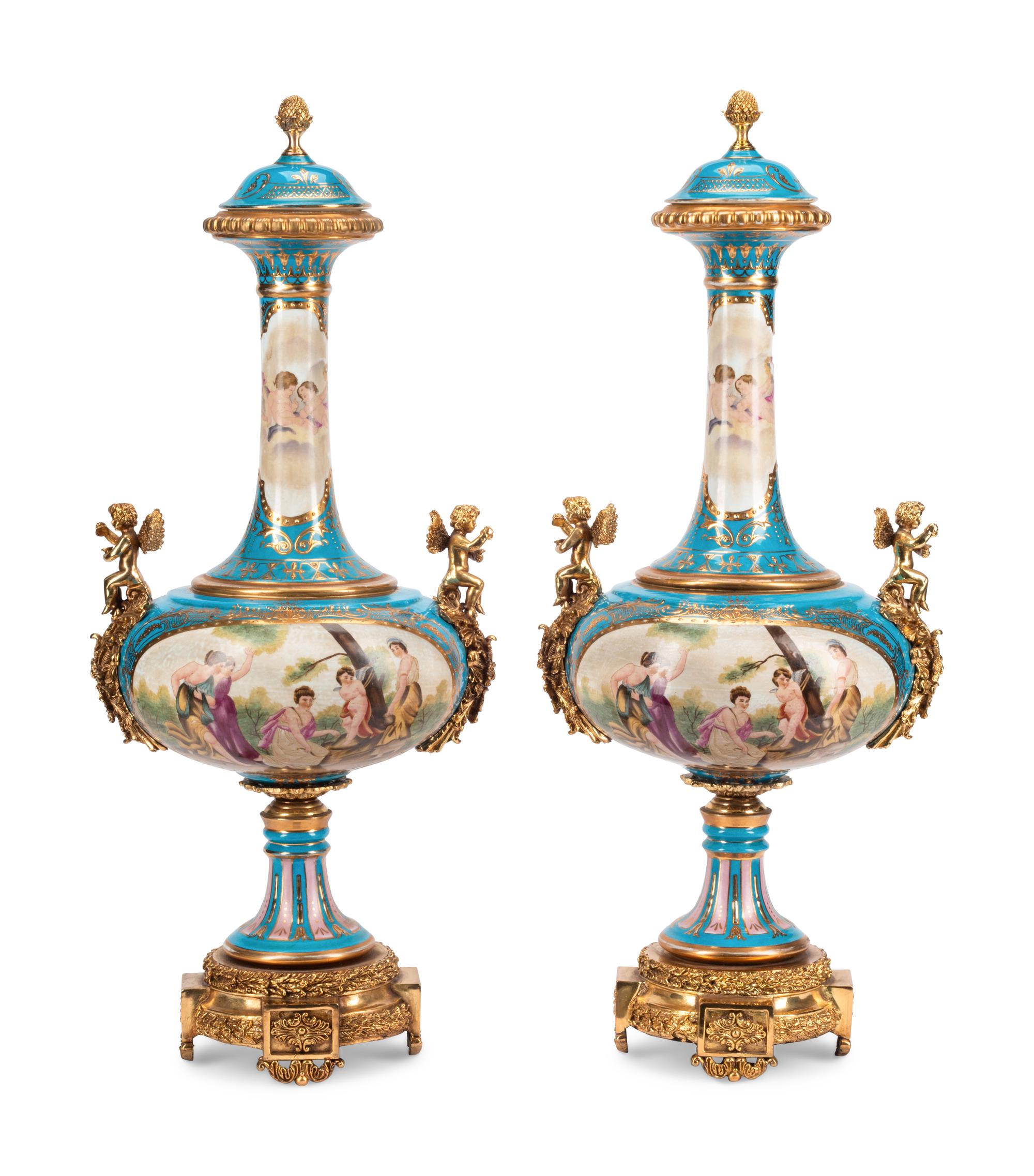 A Pair of Gilt Bronze Mounted Sèvres Style Porcelain Vases and Covers