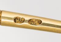 A Russian Silver-Gilt and Enamel Spoon, Mark of Maria Semenova, kokoshnik mark of Ivan Lebedkin, Moscow, having an enameled finial surm