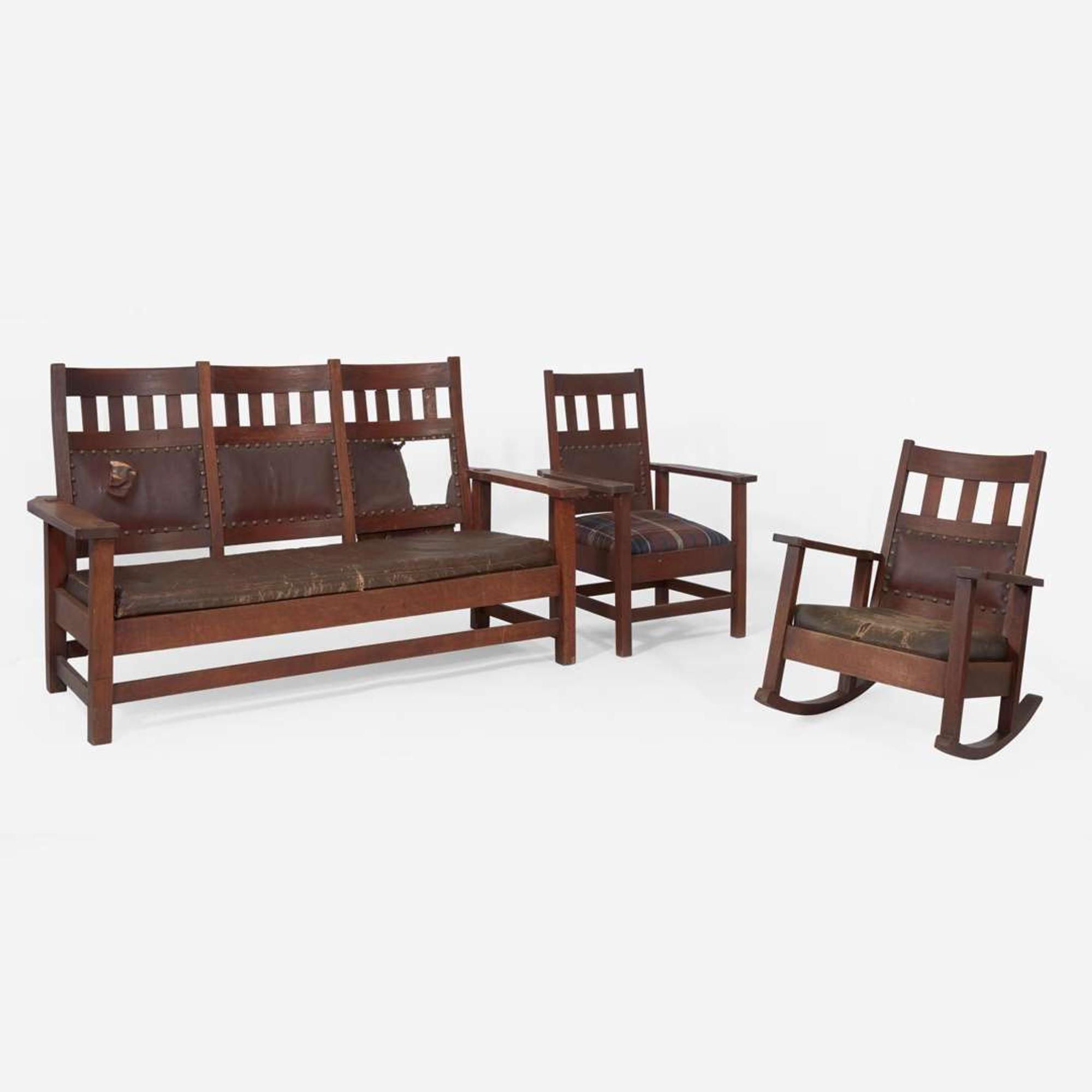 Attributed to Stickley Brothers (American, active 1891-1954) A Settle, Armchair, and Rocking Chair, USA, circa 1905