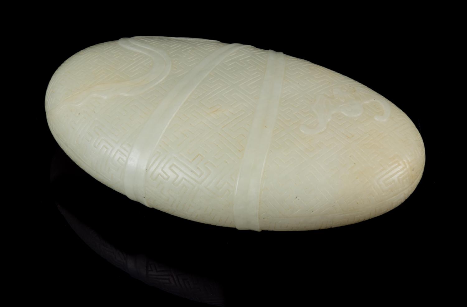 A Pale Celadon Jade Pebble Length 3 3/4 inches. — 18TH/19TH CENTURY