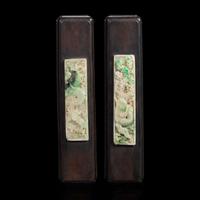 A pair of Chinese jadeite and hardwood scroll weights