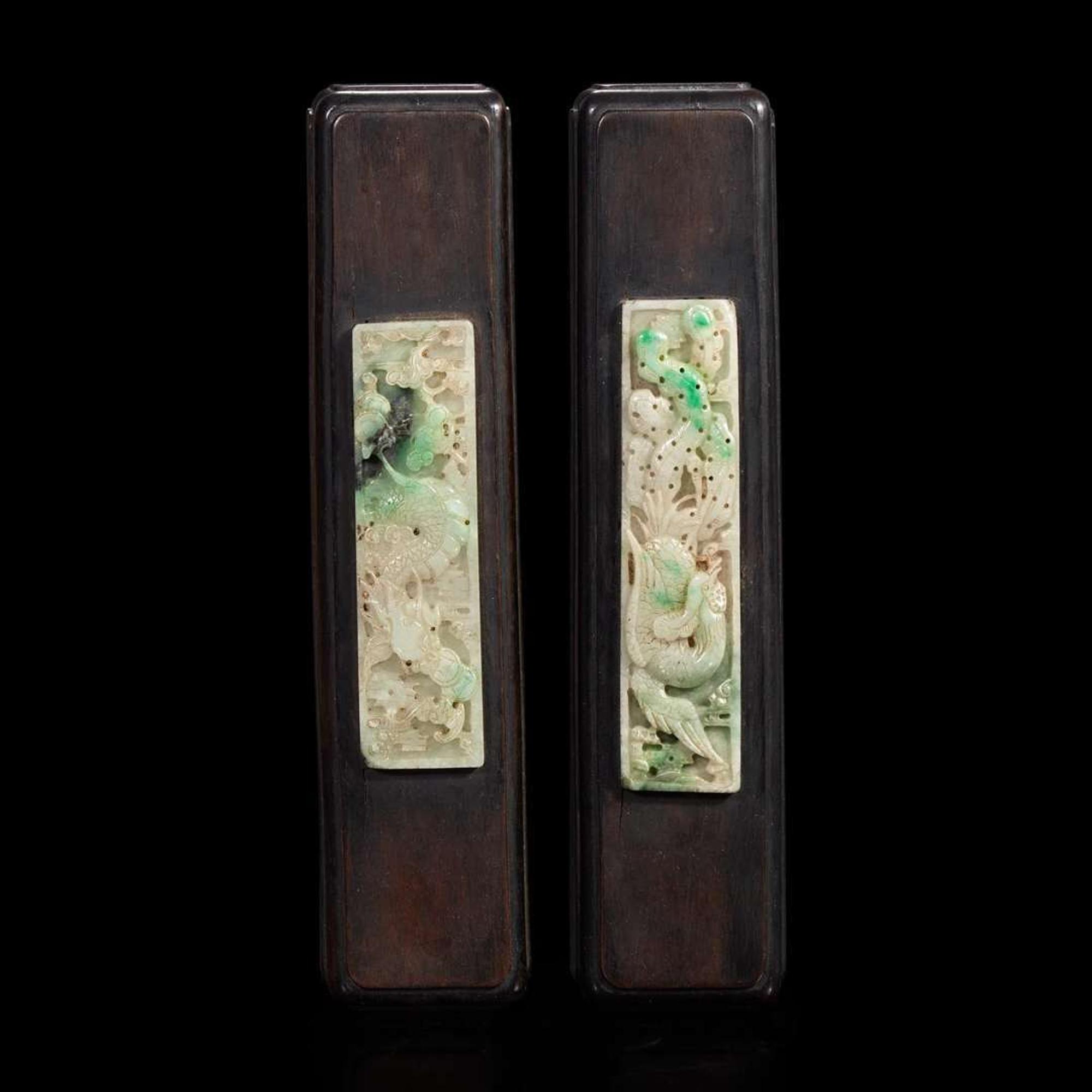 A pair of Chinese jadeite and hardwood scroll weights
