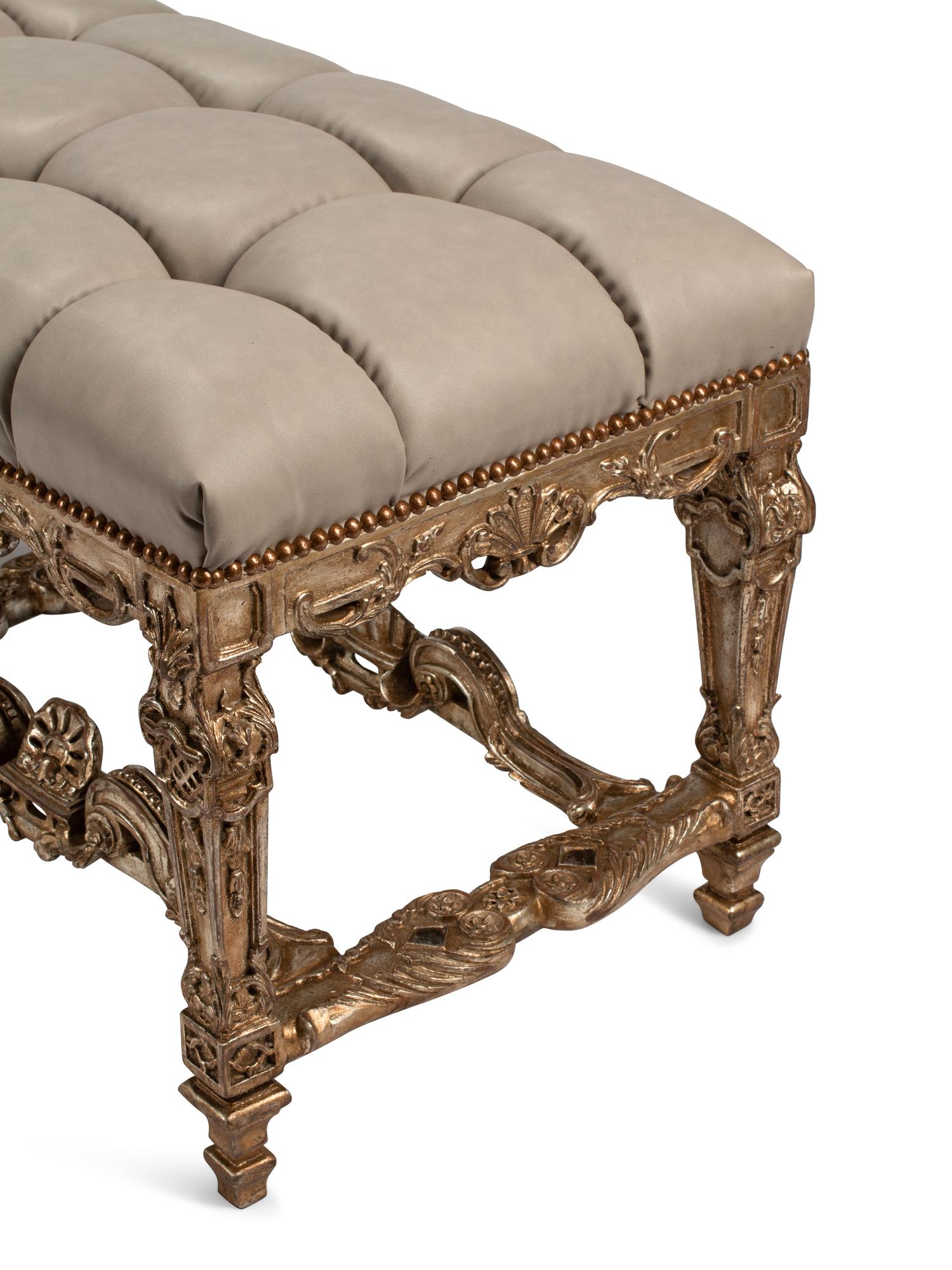 A Pair of Regence Style Leather Upholstered Silvered and Giltwood Benches