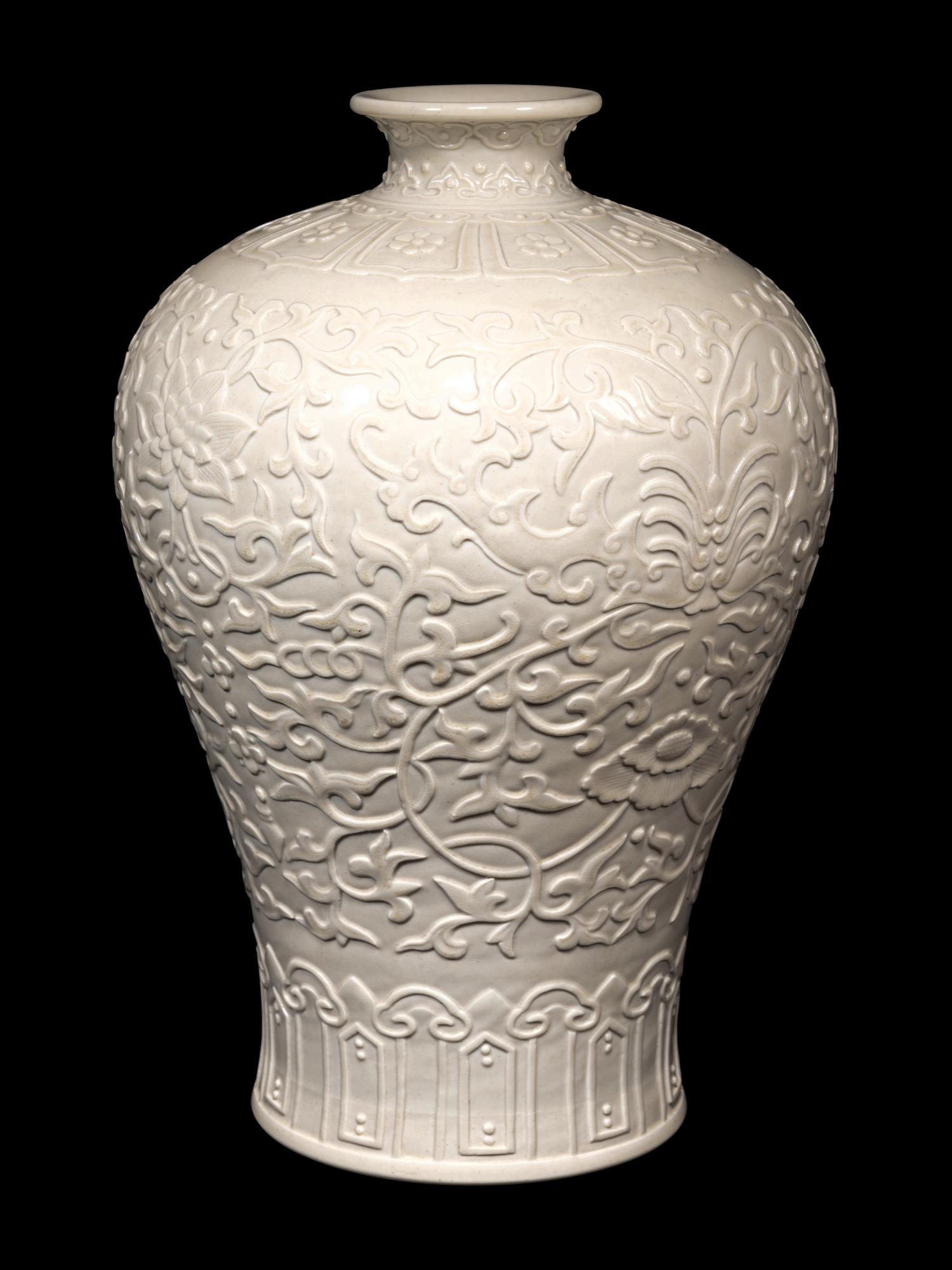 A Carved White Glazed Porcelain Meiping Vase