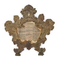 A Pair of Continental Baroque Pressed Brass Mirror Frames
