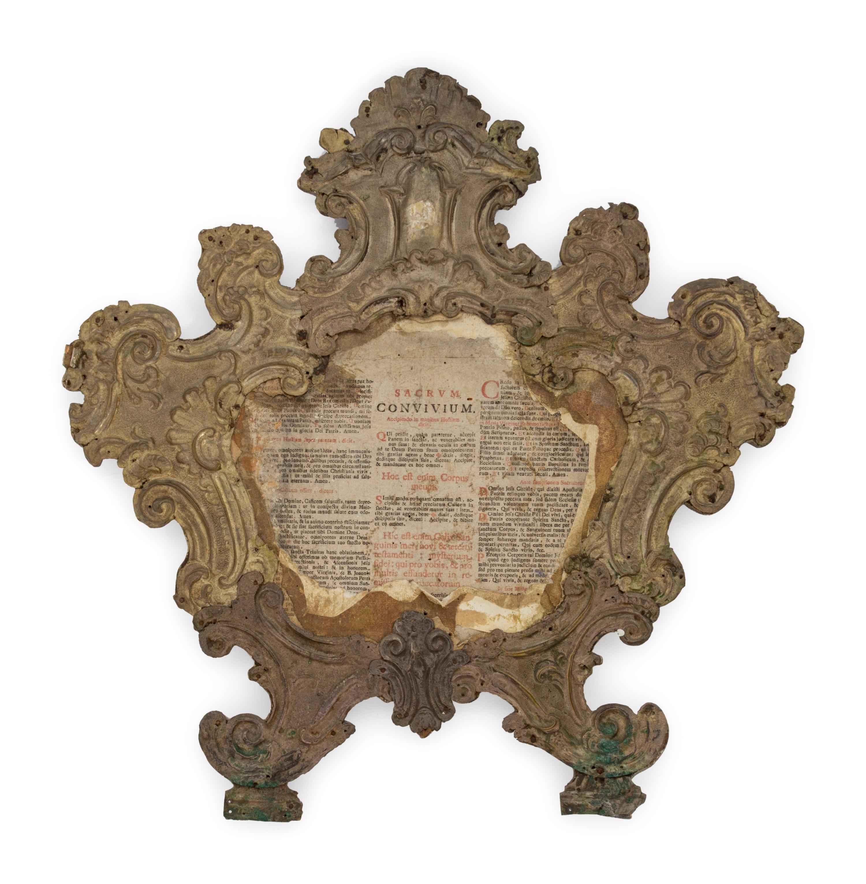 A Pair of Continental Baroque Pressed Brass Mirror Frames